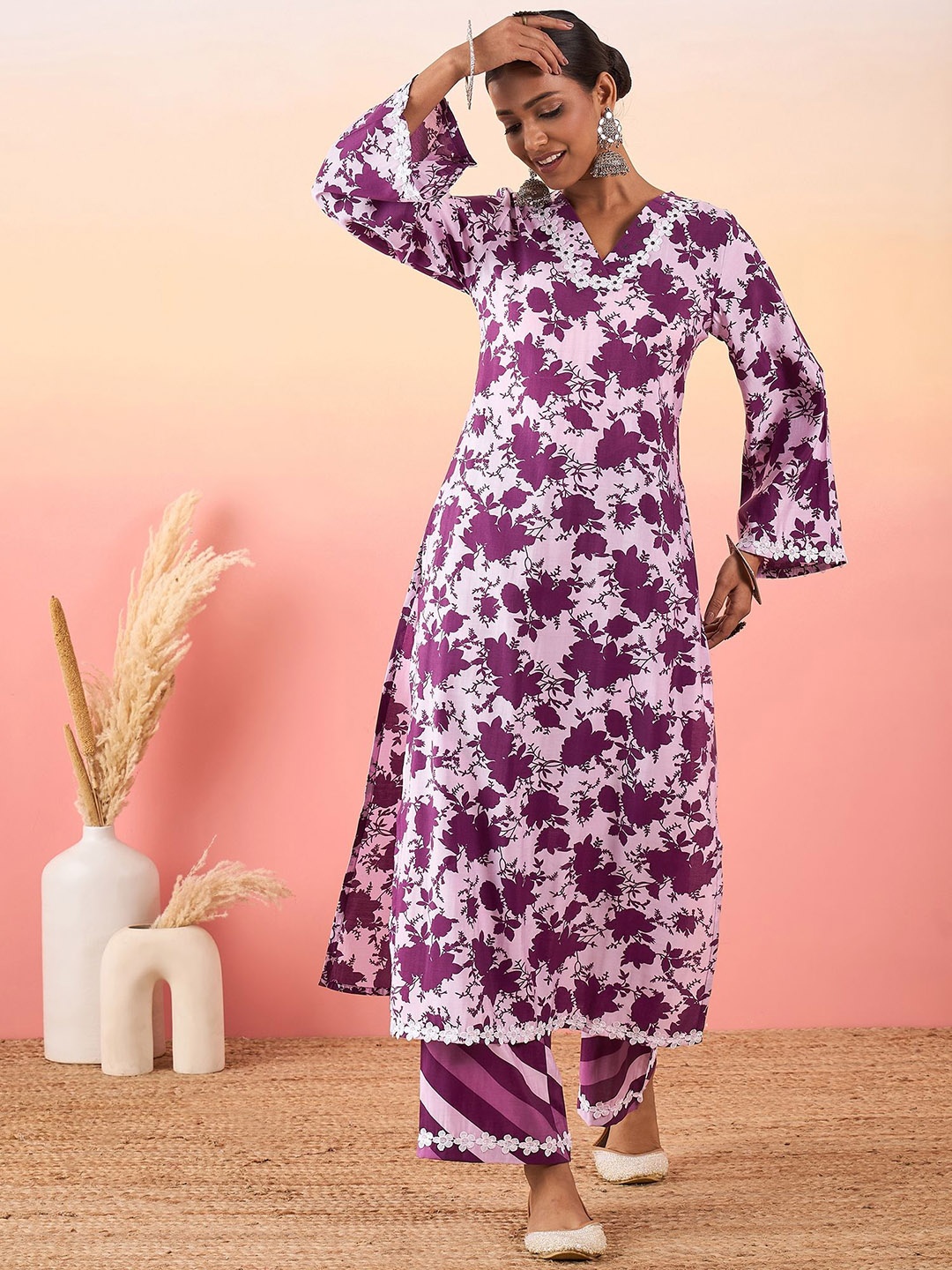 

Madhuni Women Floral Printed Regular Sequinned Kurta with Palazzos, Purple