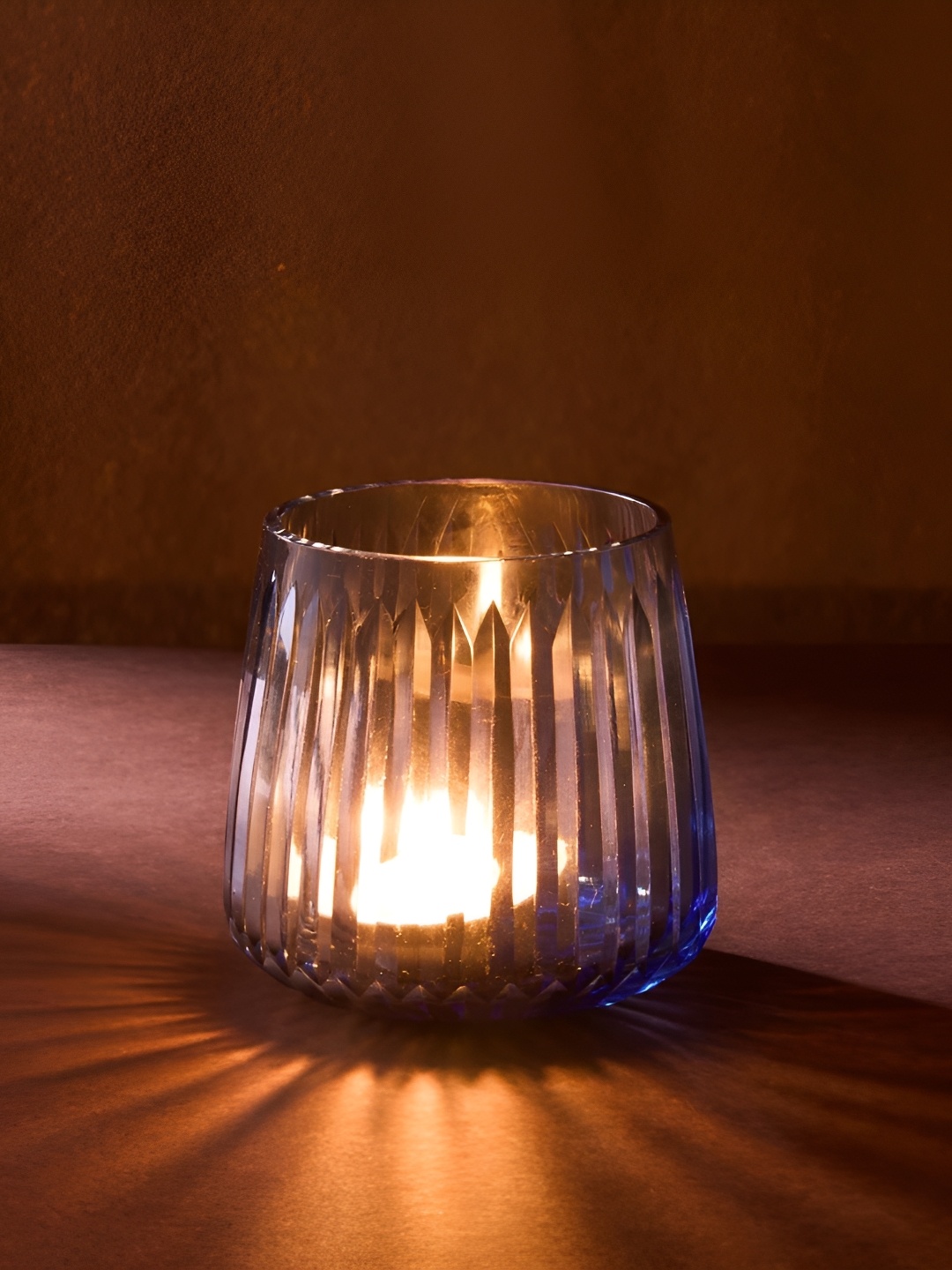 

Fabindia Blue & Transparent Glass T-Lite Candle Holder