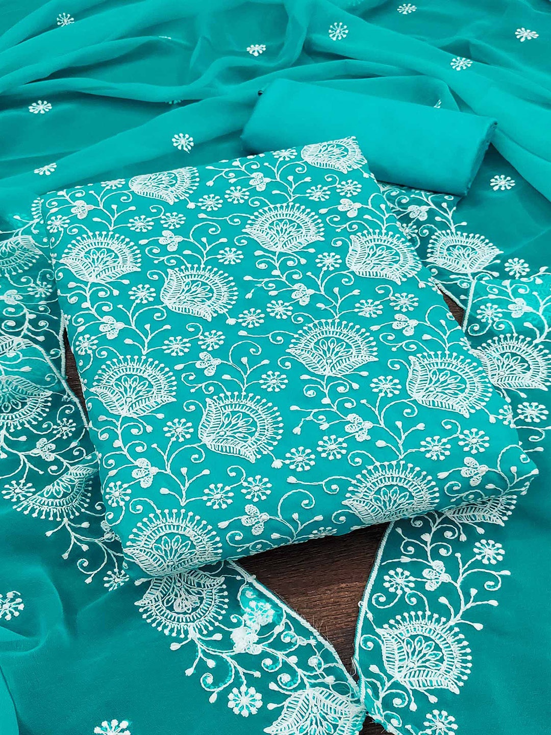 

Peachmode Embroidered Silk Georgette Unstitched Dress Material, Turquoise blue