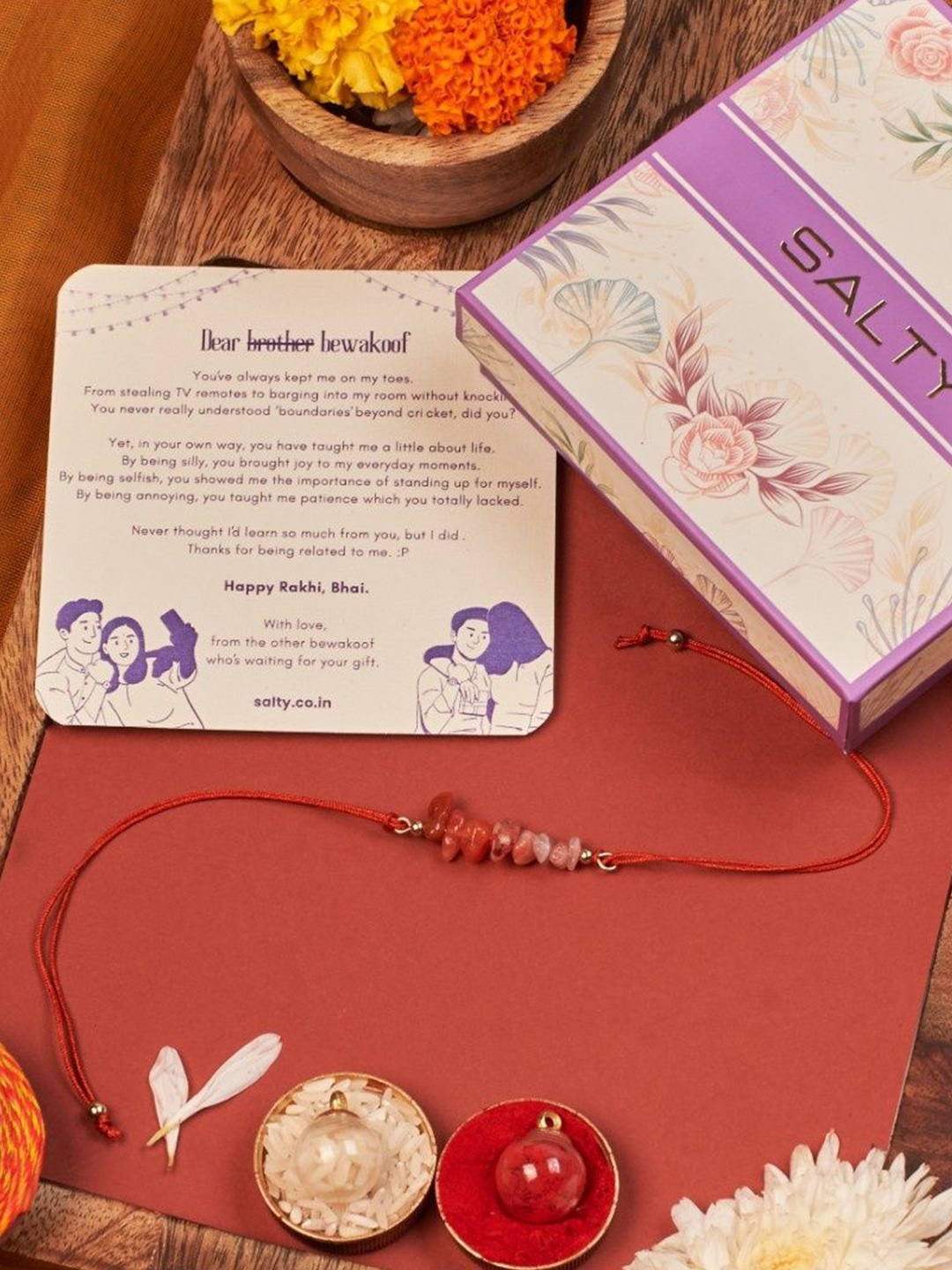 

SALTY Beaded Thread Rakhi With Roli Chawal & Greetings Card, Red
