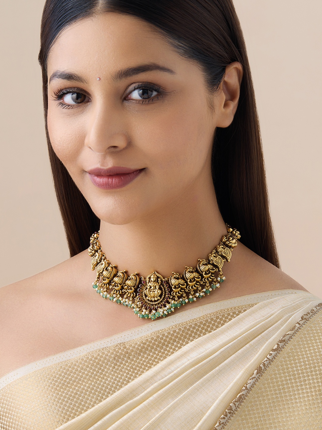 

Kushal's Fashion Jewellery Artificial Stones Gold Plated Antique Necklace