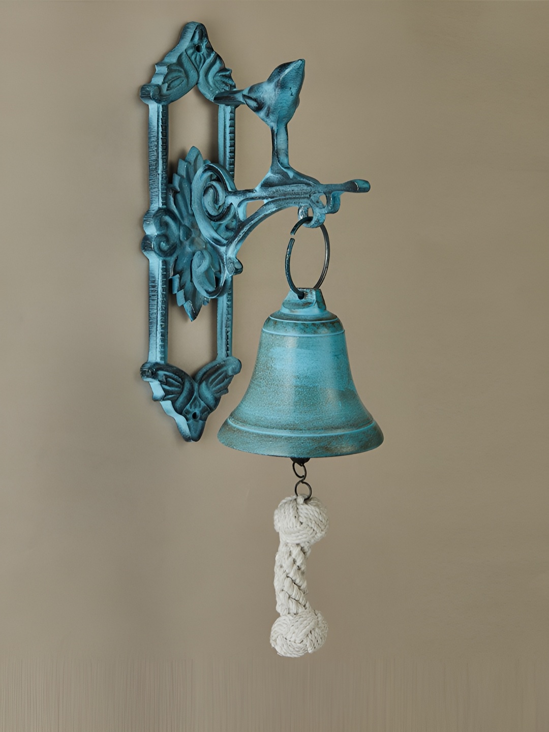 

Fabindia Blue & White Textured Metal Door Bell Wall Decor