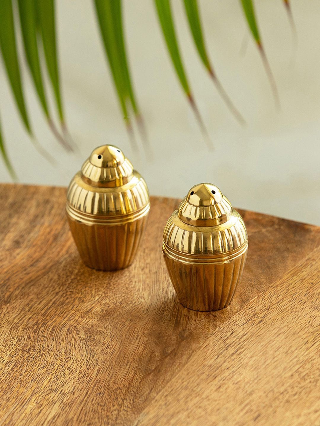 

ExclusiveLane Gold Toned Textured Brass Glossy Salt and Pepper Shakers
