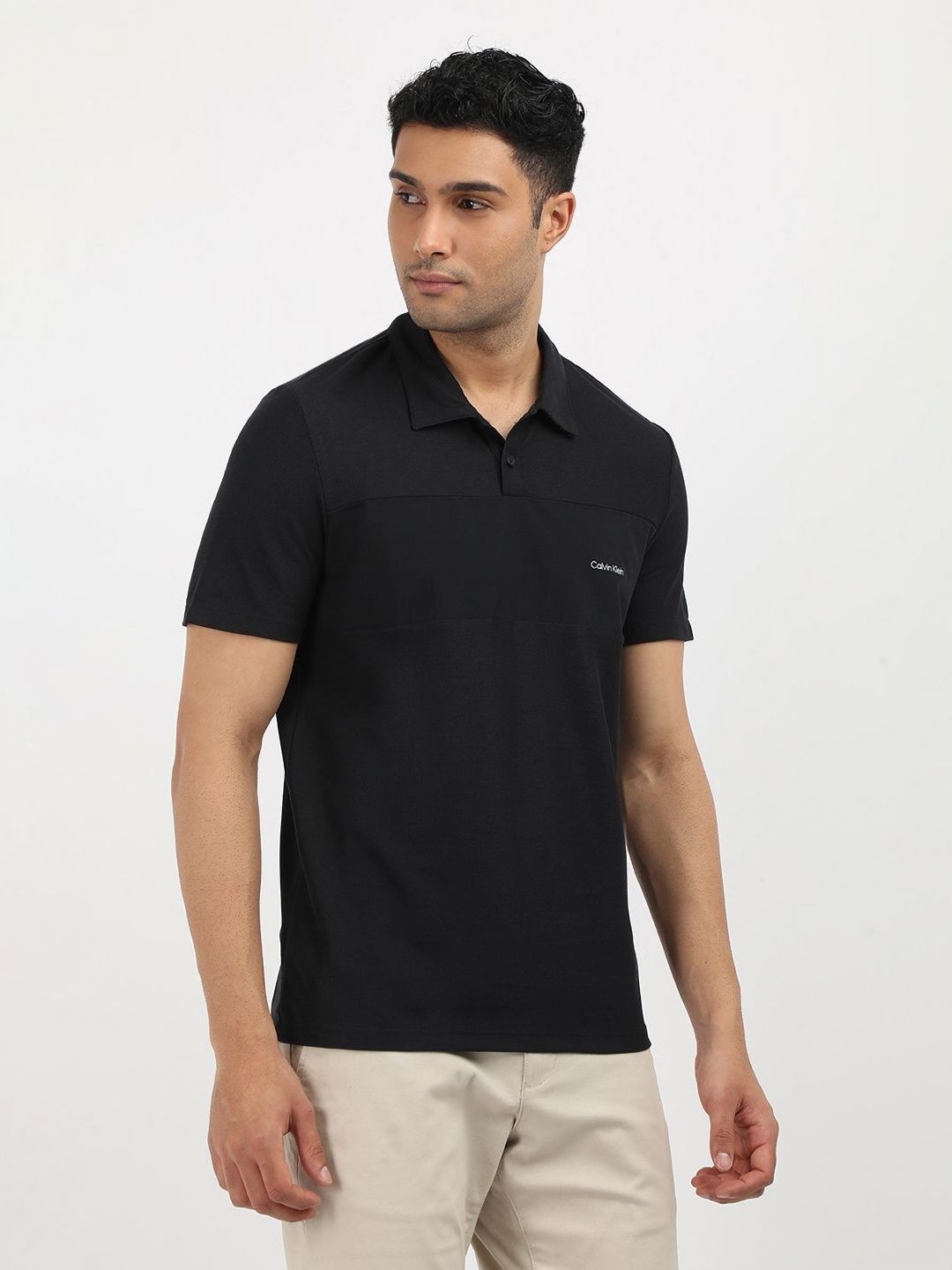 

Calvin Klein Jeans Men Colourblocked Polo Collar Pockets T-shirt, Black