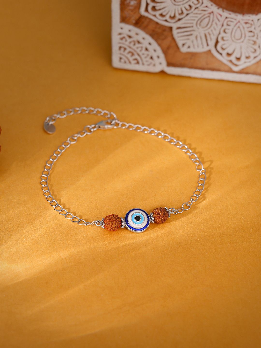 

GIVA 925 Silver Rudraksha Evil Eye Beaded Braclet Rakhi With Roli Chawal