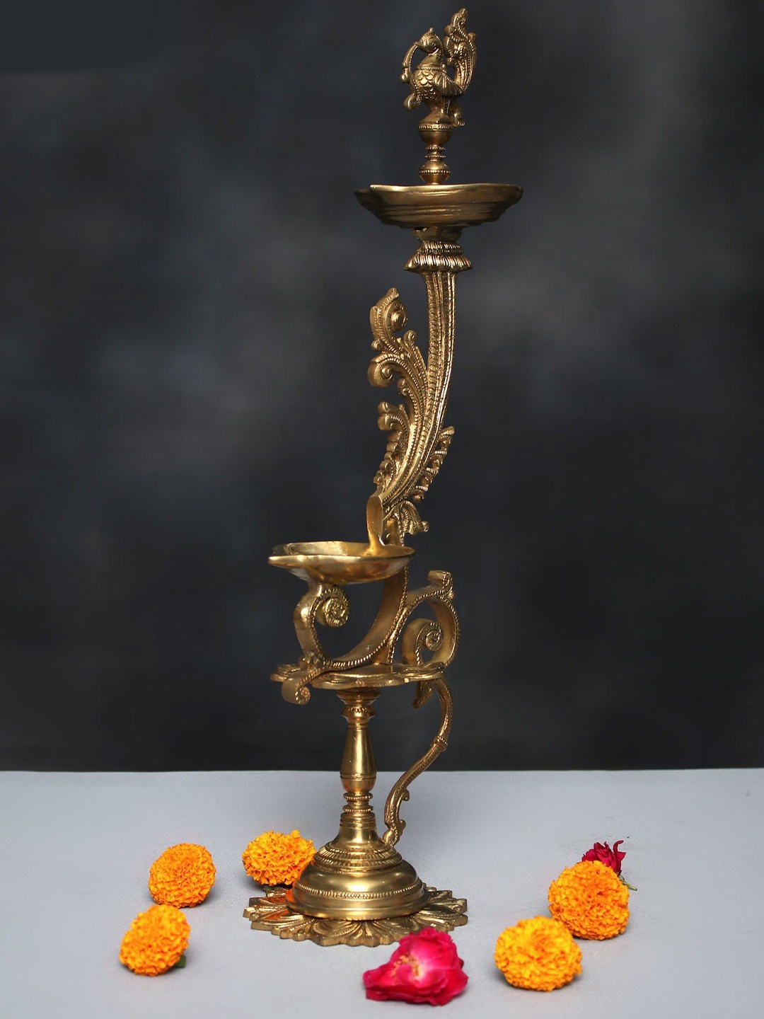 

Exotic India Brass Peacock Diya, Gold