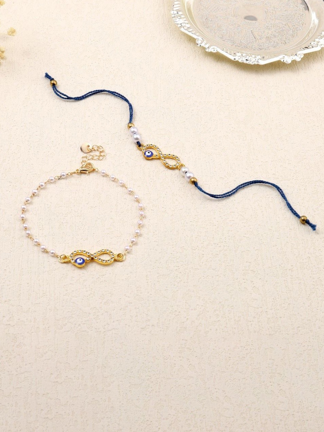 

SALTY Infinity Evil Eye Charm Bhaiya and Bhabhi Rakhi, Gold