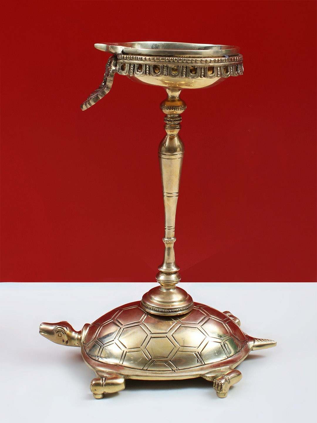 

Exotic India Brass Diya on Tortoise, Gold