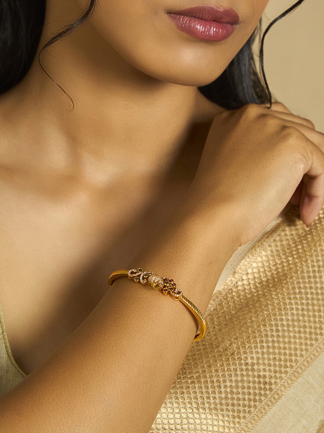 

Kushal's Fashion Jewellery Cubic Zirconia Antique Gold Plated Kada Bracelet