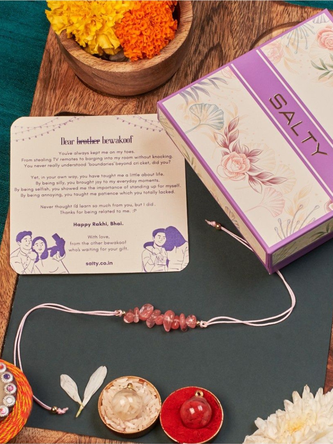 

SALTY Beaded Thread Rakhi With Roli Chawal & Greetings Card, Pink