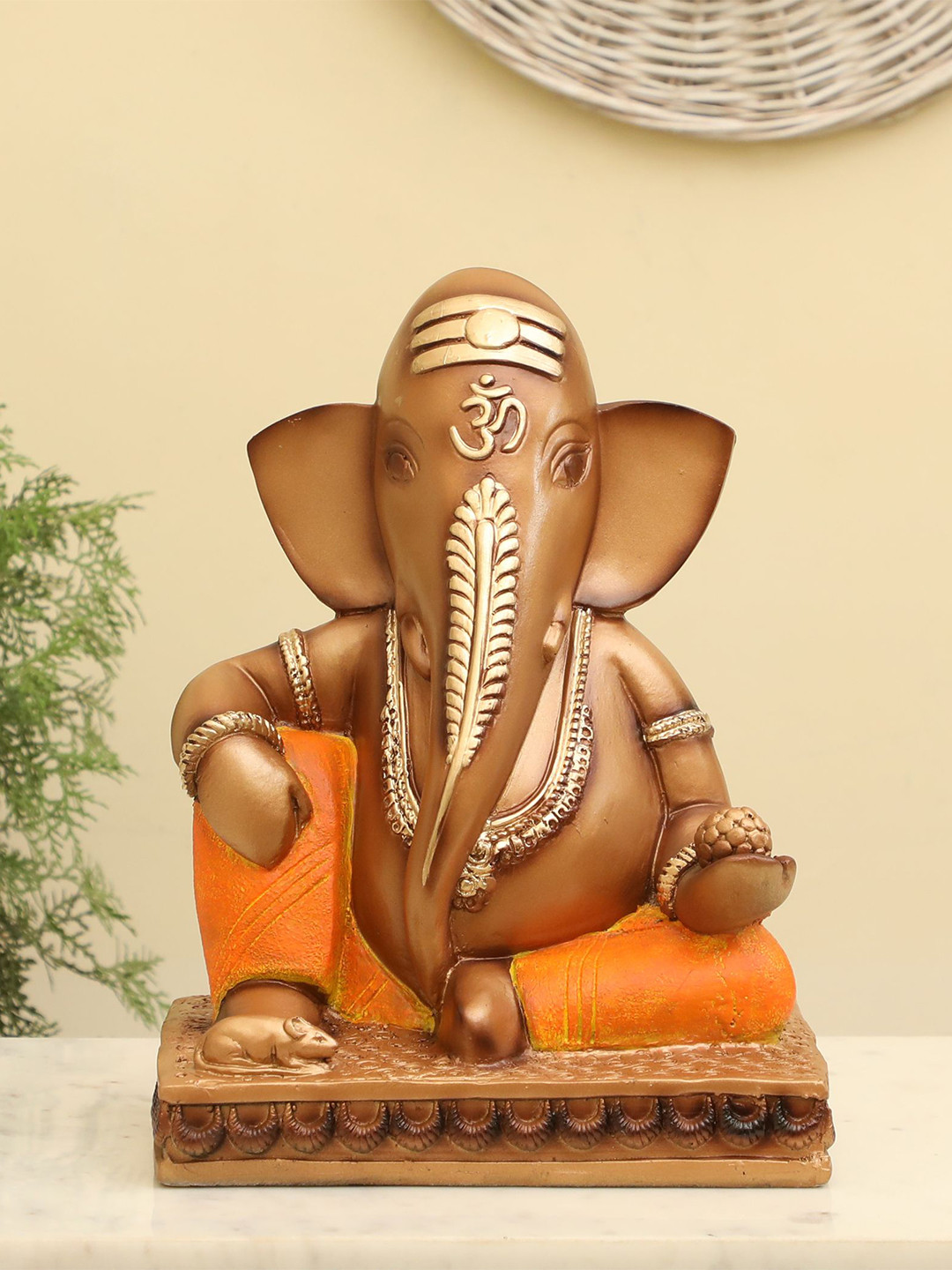 

vedas Mystic Indiana Brown & Gold Toned Religious Idol Showpiece