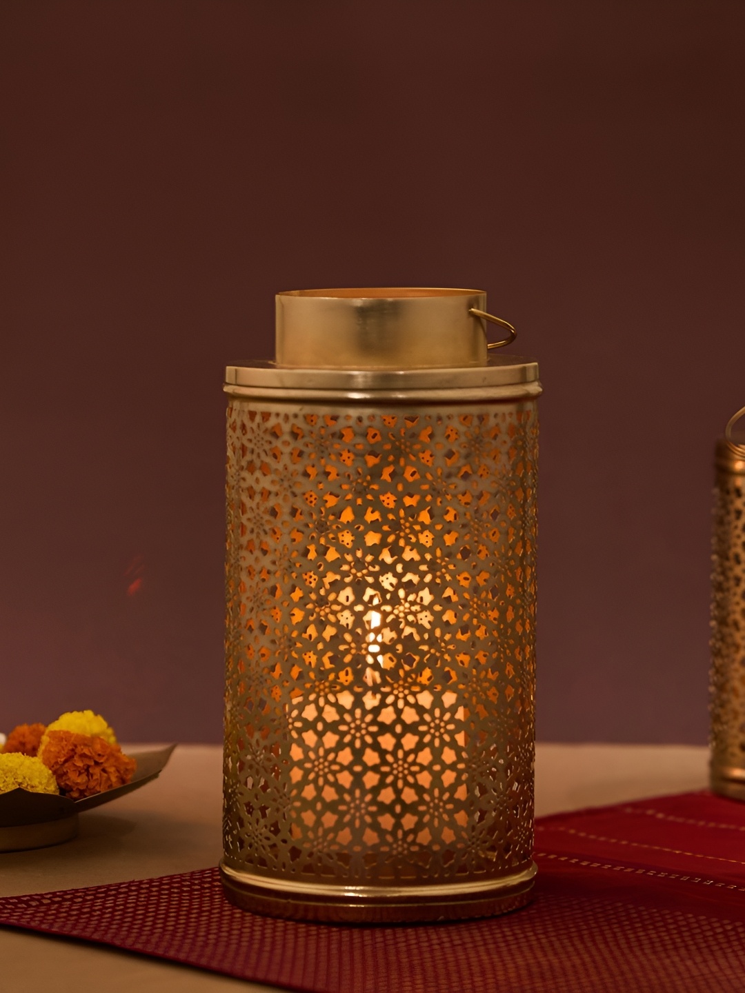 

Fabindia Bronze-Toned Cutwork Noor T-Lite Candle Holder