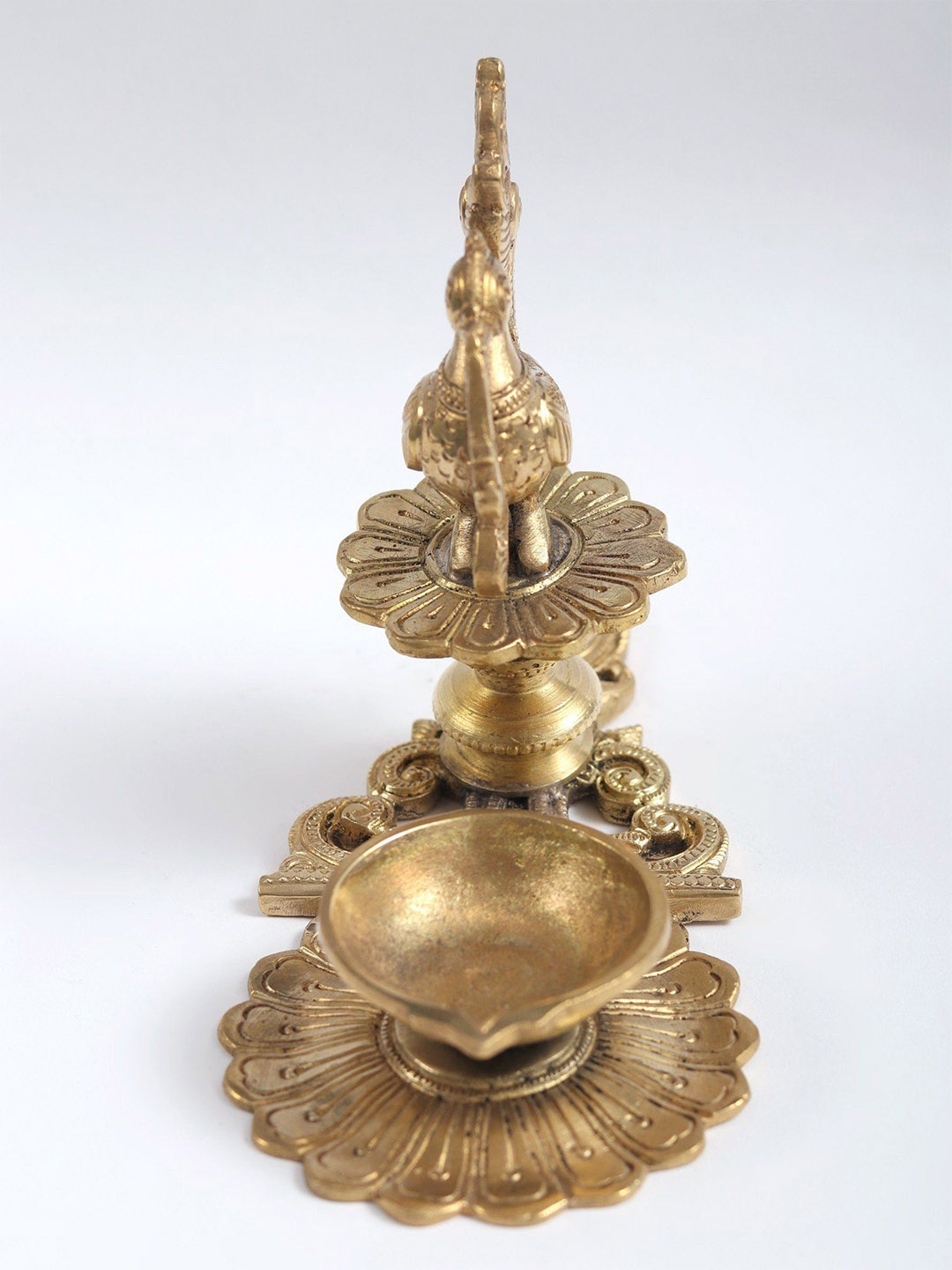 

Exotic India Brass Handheld Peacock Diya, Gold