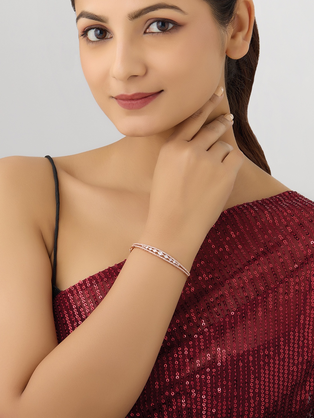 

Kushal's Fashion Jewellery Cubic Zirconia Rose Gold-Plated Kada Bracelet