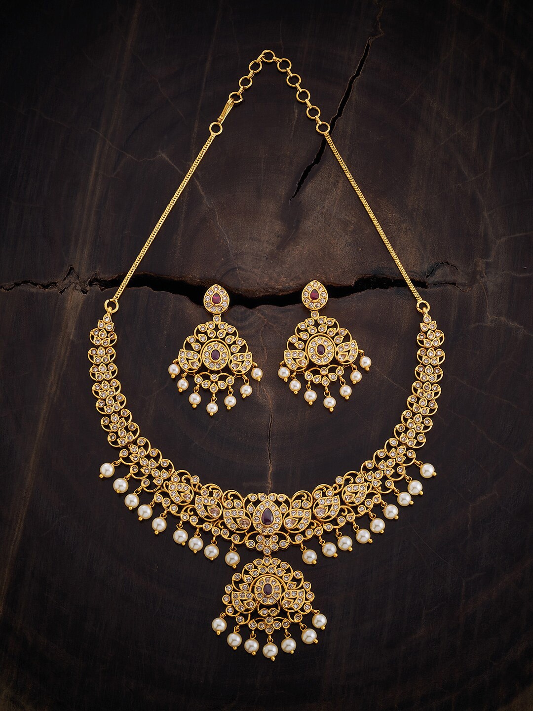 

Kushal's Fashion Jewellery Gold Plated CZ Studded & Beaded Antique Jewellery Set