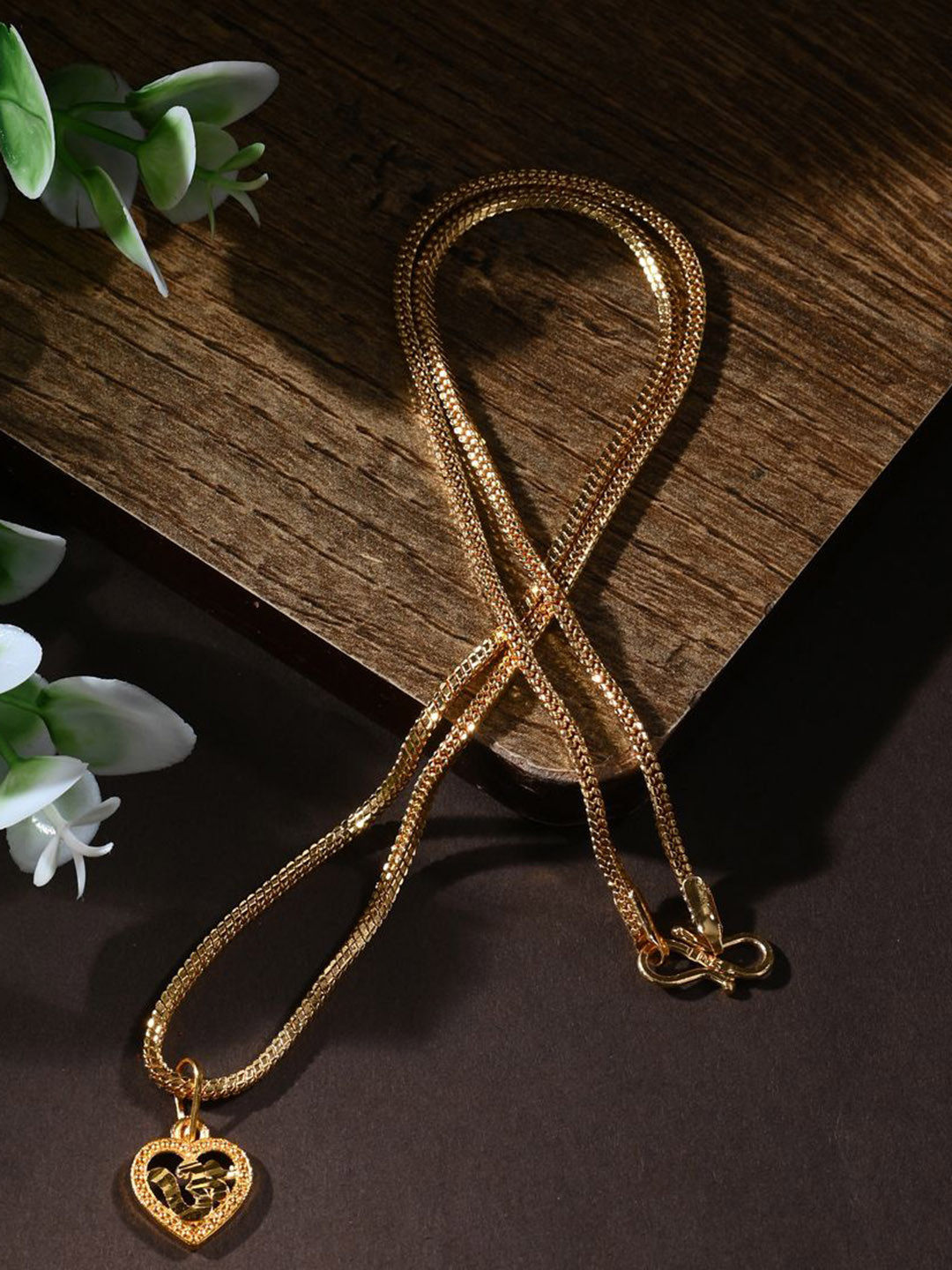 

AanyaCentric Gold-Plated Heart Shaped Om Pendant with Chain