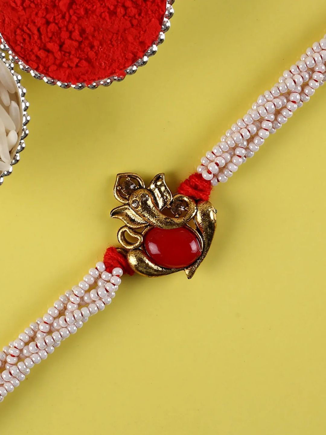 

fnp Ganesha Rakhi Auspicious Mauli Rakhis, Gold