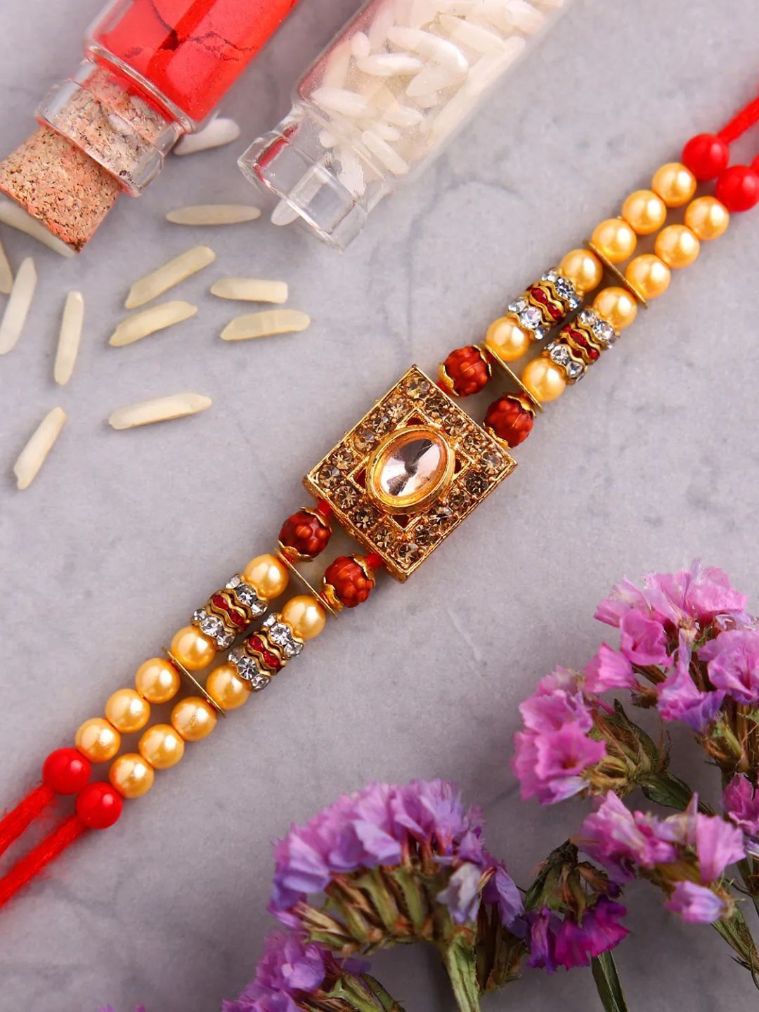 

fnp Special Kundan Rakhi For Brother Magical Evil Eye, Red