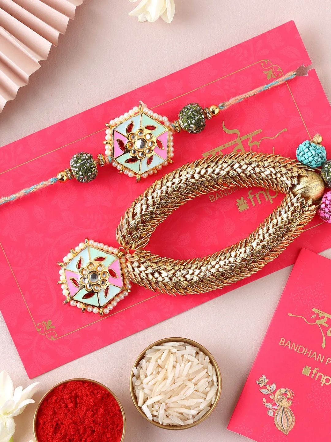 

fnp Meenakari Bhaiya Bhabhi Ethnic Rakhi Bhaiya-Bhabhi Rakhis, Gold