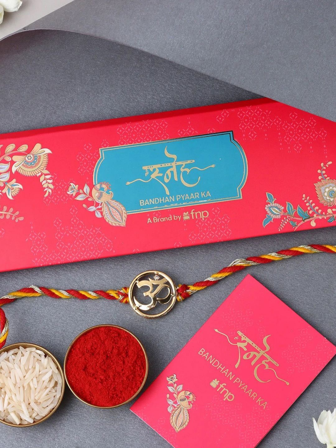 

fnp Sacred Om Golden Blessing Rakhi Mauli Rakhis, Gold