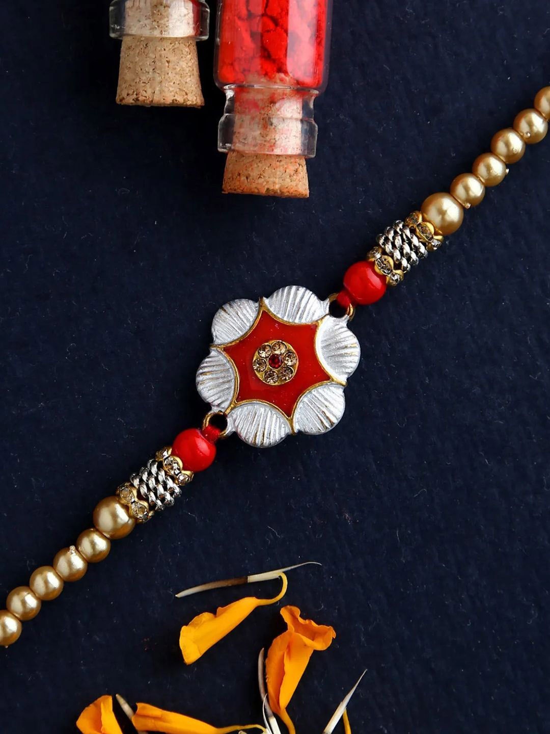

fnp Regal Scarlet Petal Rakhi Mauli Rakhis, Gold
