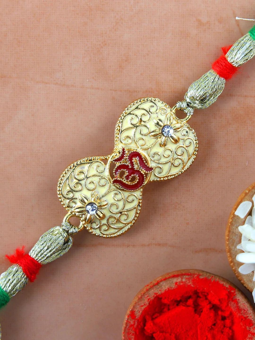 

fnp Om Rakhi Sacred Mauli Rakhis, Gold