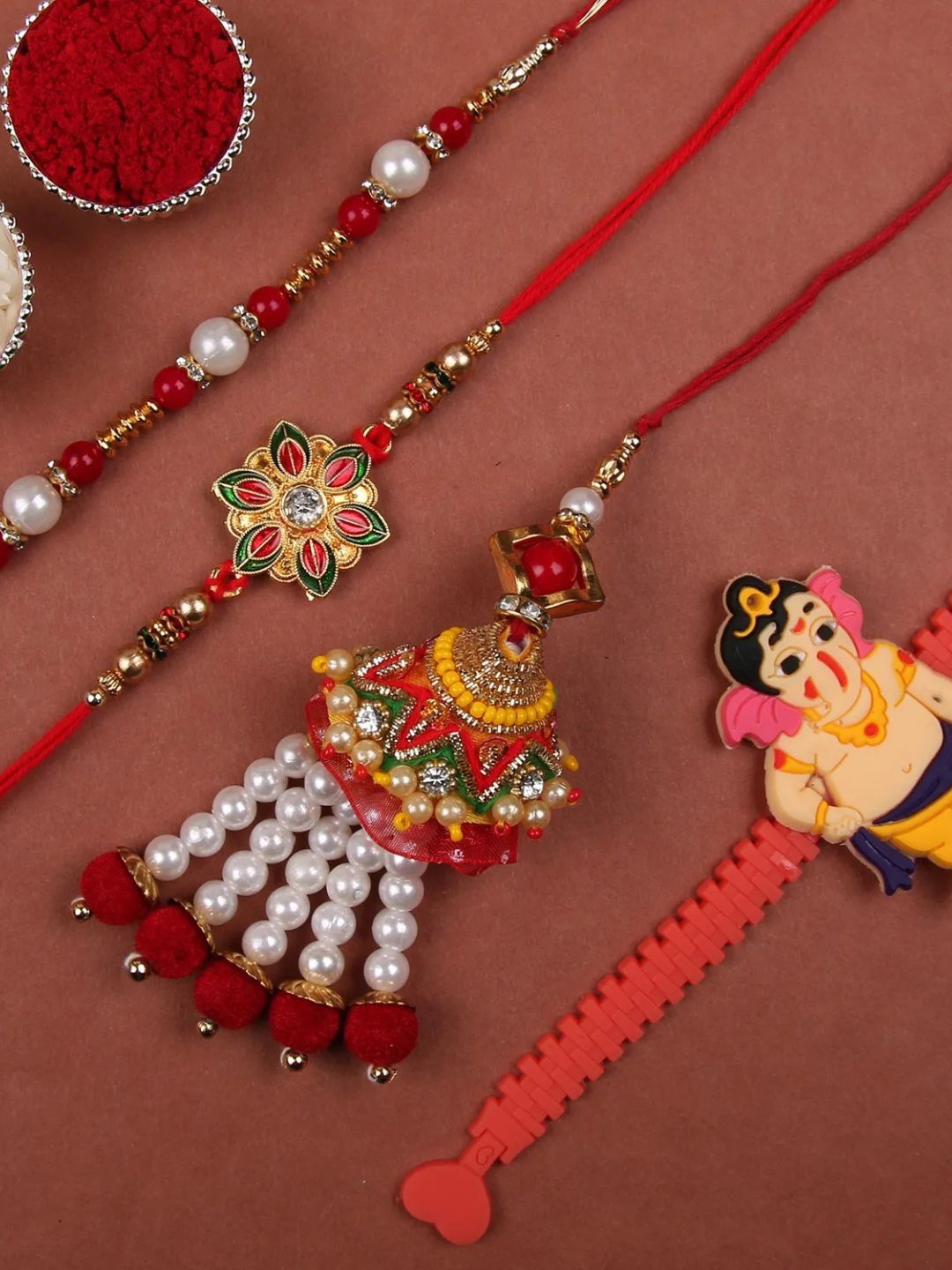 

fnp Set of 3 Rakhis Lumba American Diamond, Red