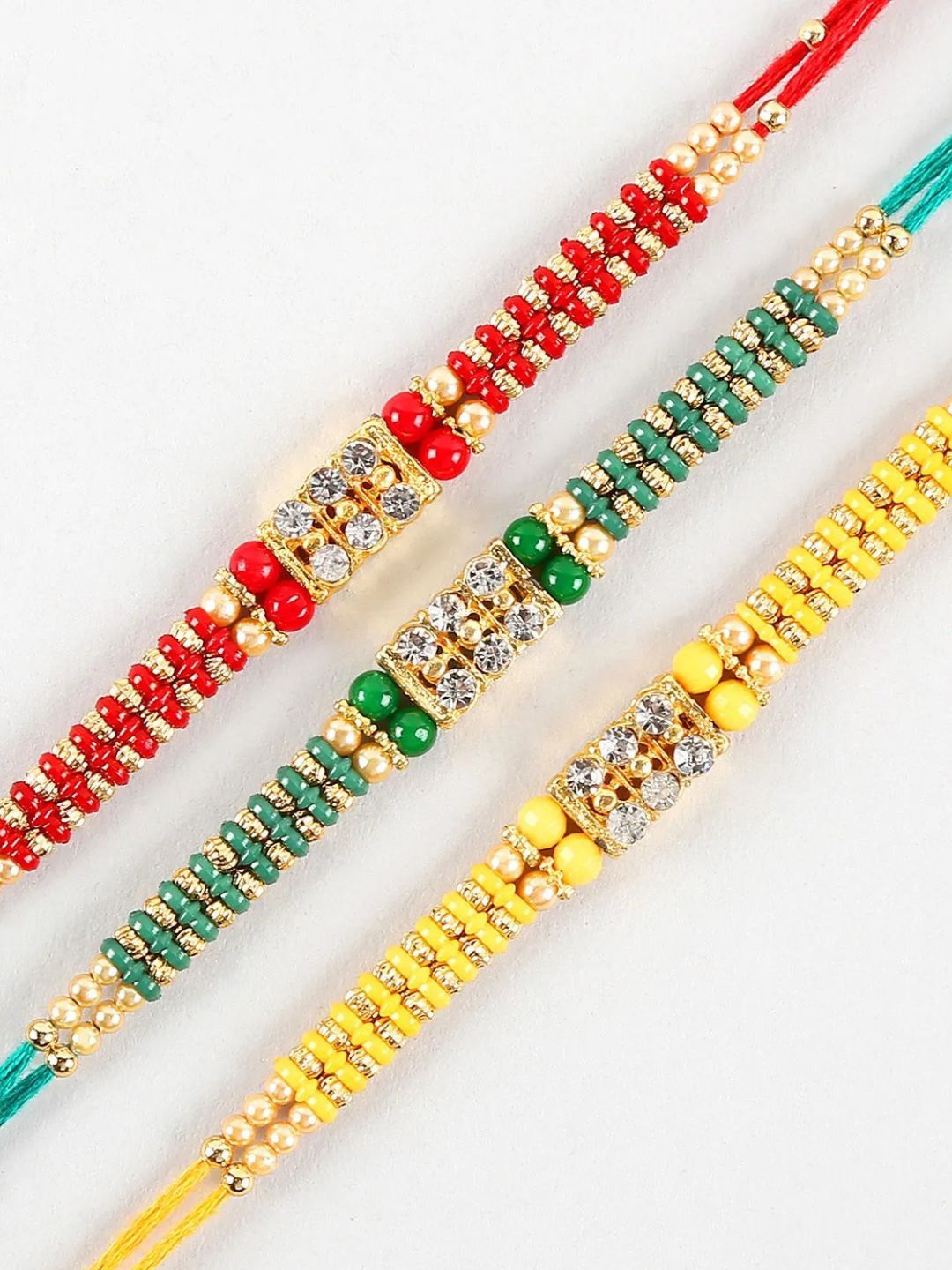 

fnp Sneh Ethnic American Diamond Rakhis Set of 3 Bracelet Rakhis, Red