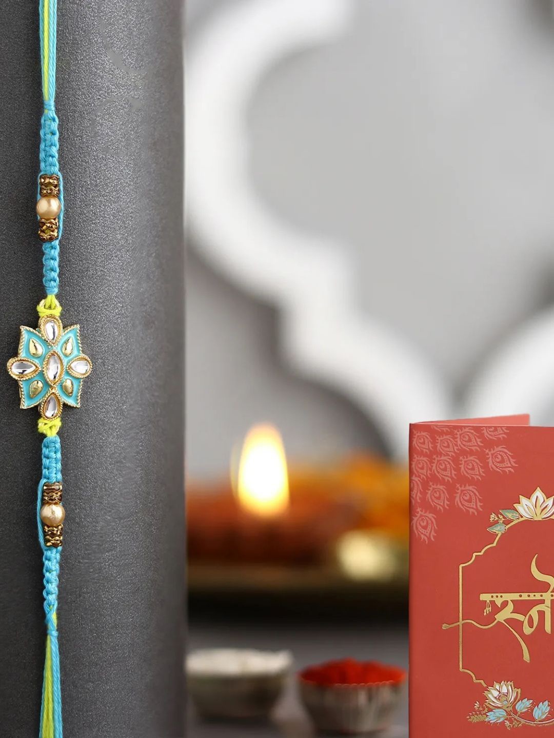 

fnp Jewel of Brotherhood Pendant Rakhi Magical Evil Eye, Blue
