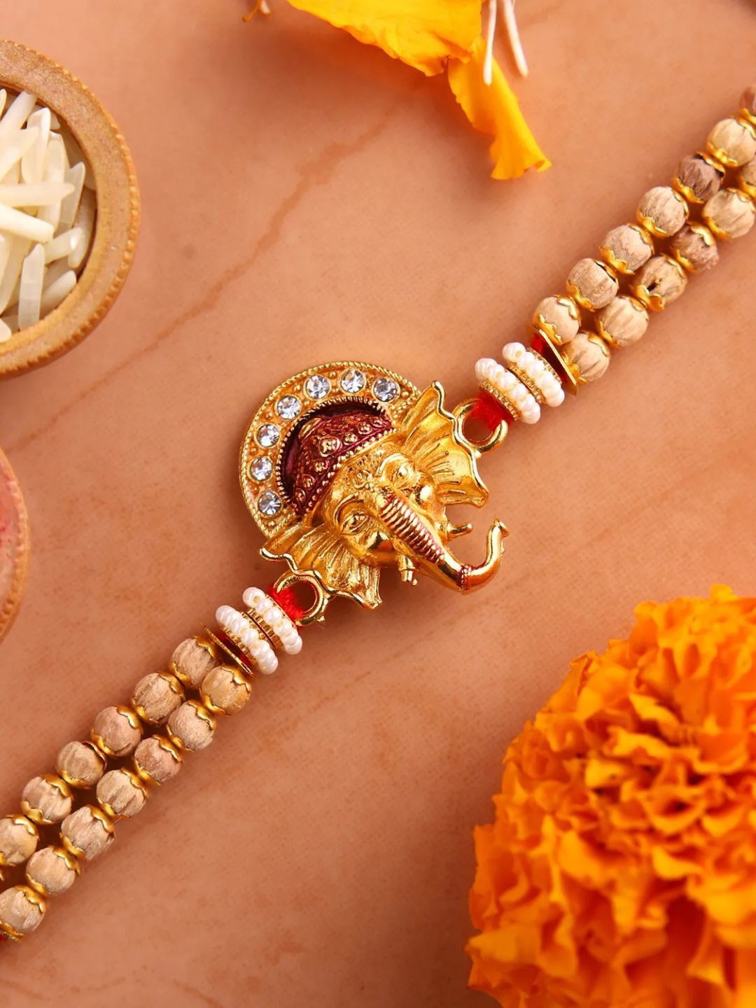 

fnp Beautiful Ganesha Rakhi For Brother Silver Selections, Gold