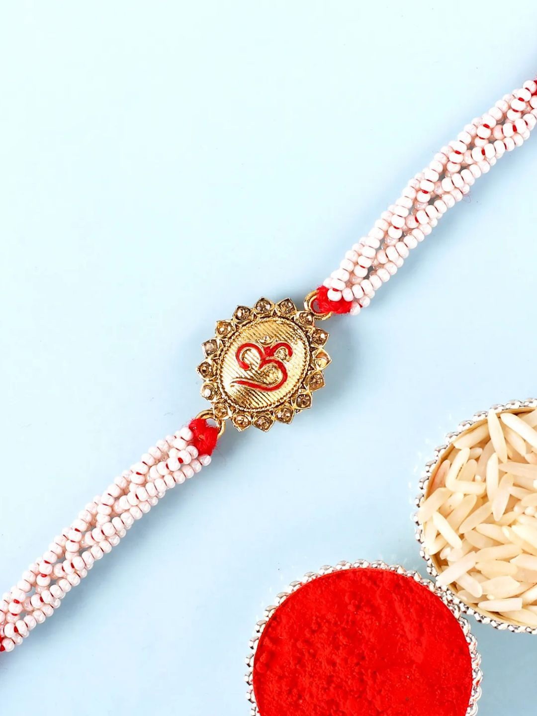 

fnp Beautiful Auspicious Om Rakhi Kids Collection, White
