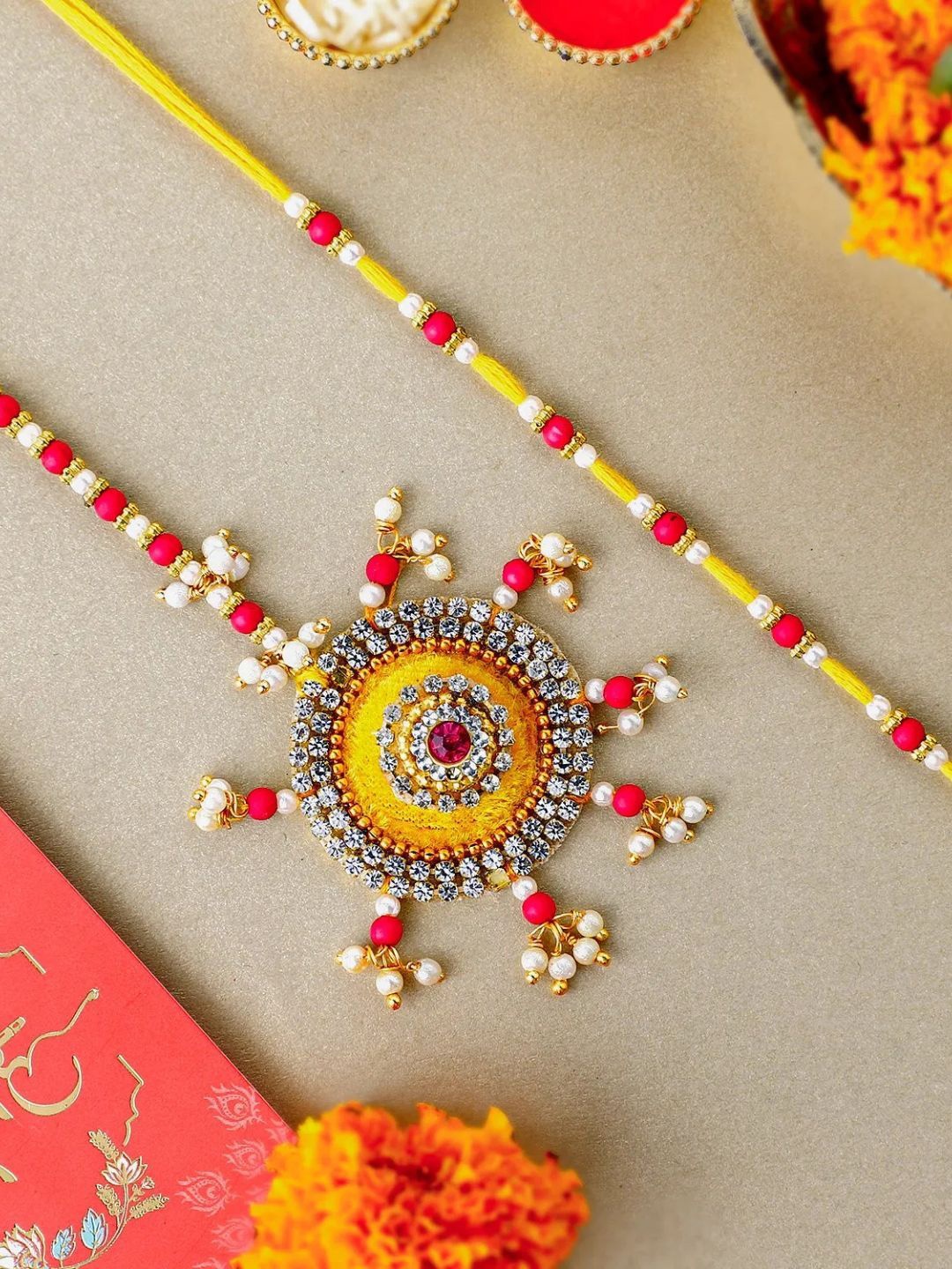 

fnp Bhaiya Bhabhi Beads Rakhi set Lumba Rakhis, Yellow