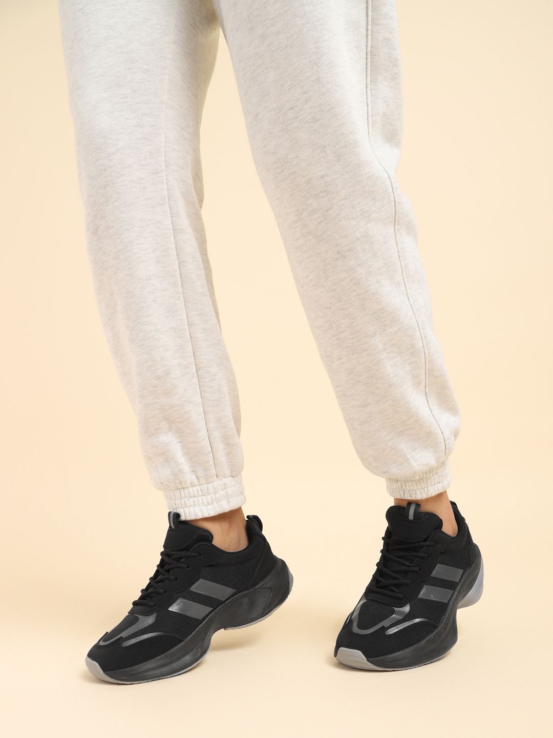 

Truffle Collection Women Colourblocked PU Sneakers, Black