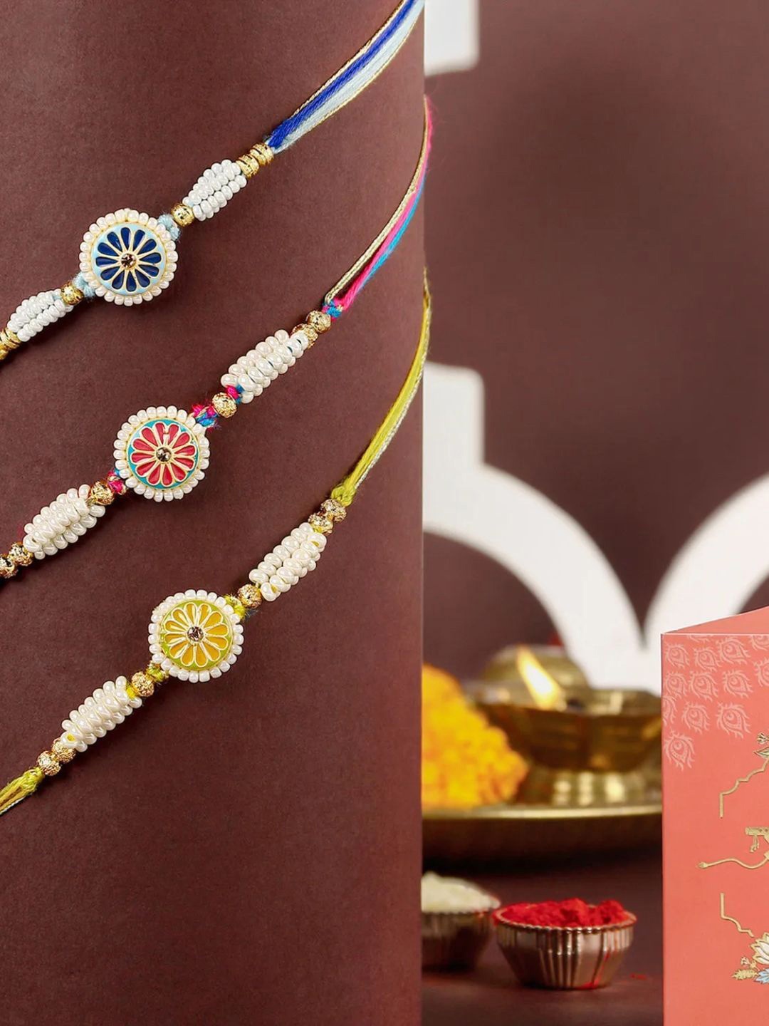 

fnp Floral Heritage Round Rakhi Set of 3 Classic Pearls, White