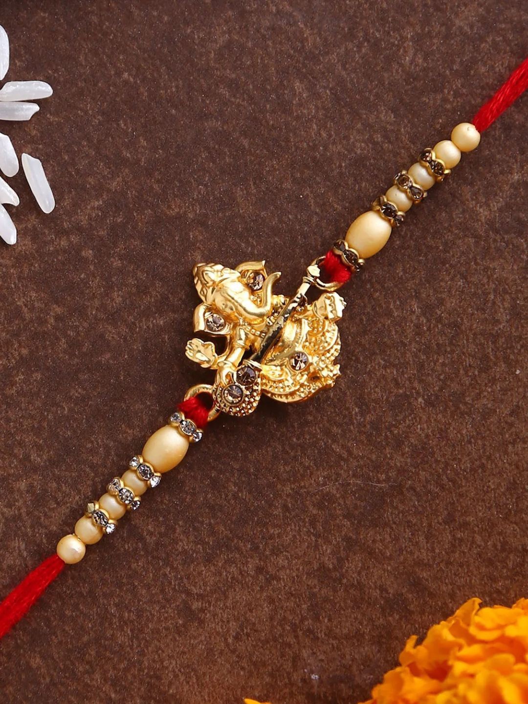 

fnp Ganesha Motif Rakhi American Diamond, Red