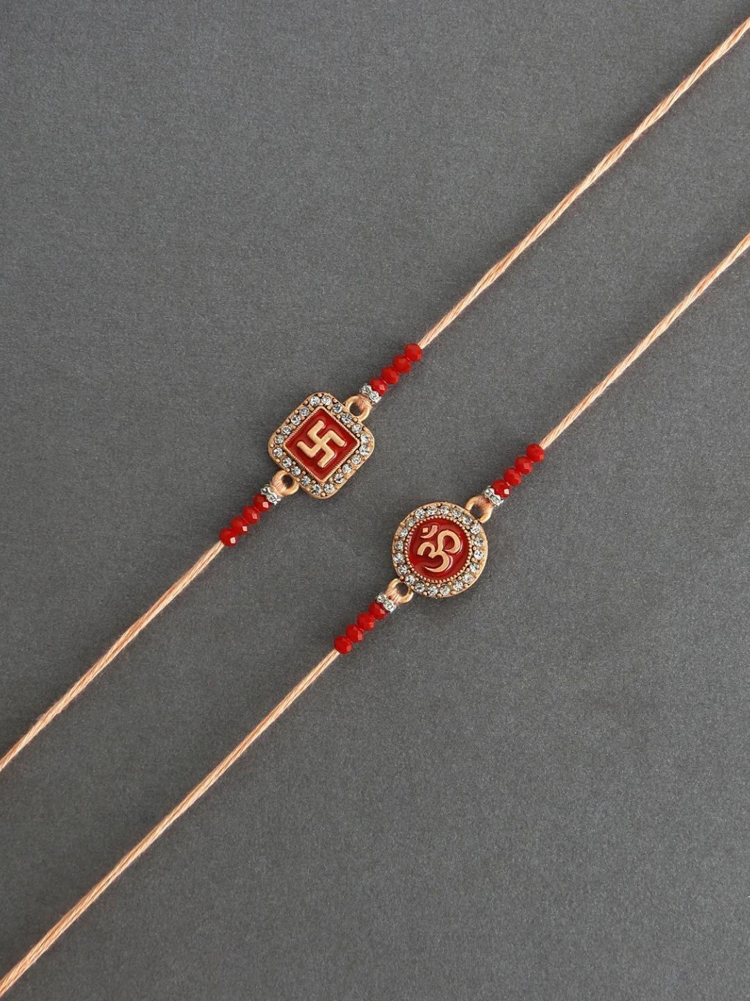 

fnp Ethereal Om Swastik Pair Rakhi Silver Selections, Gold