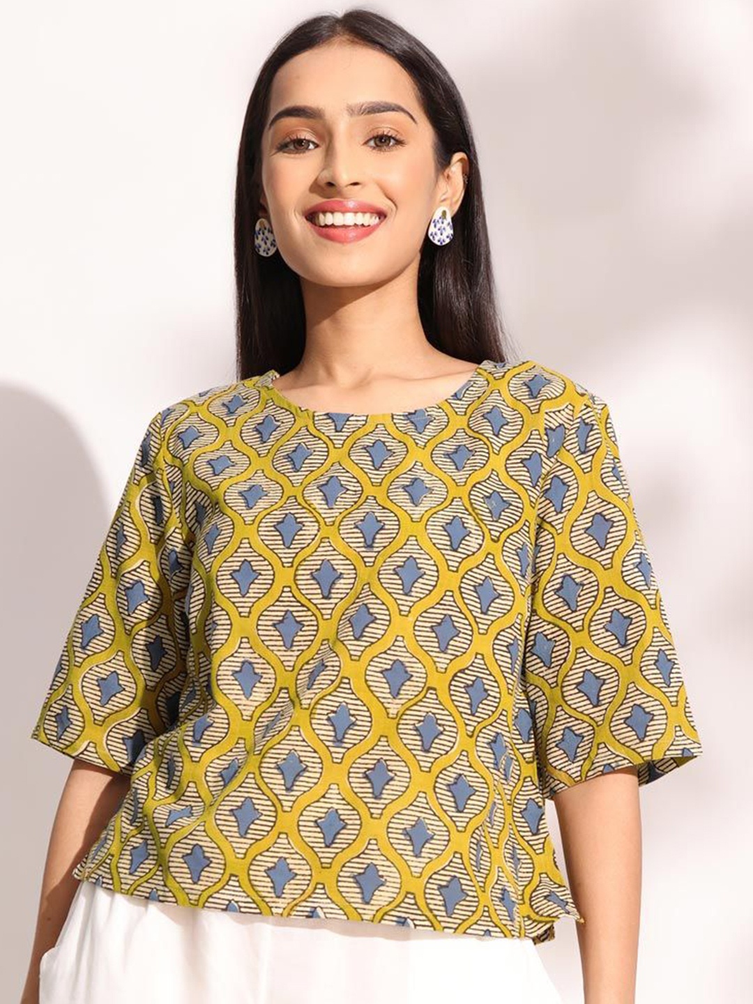 

Fabindia Women Abstract Printed Round Neck Cotton Top, Mustard