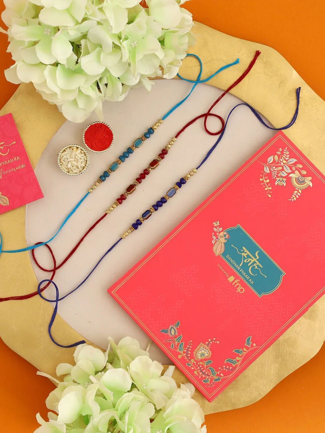 

fnp Dynamic Unity Bead Rakhi Set of 3 Bracelet Rakhis, Red