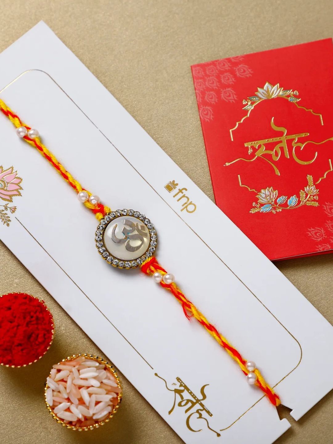 

fnp Mystic Om Essence Rakhi Silver Selections, Gold