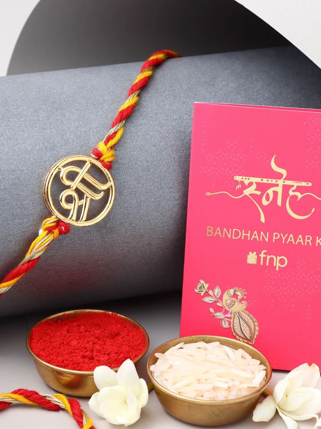 

fnp Shree Rakhi Classic Pearls, Red