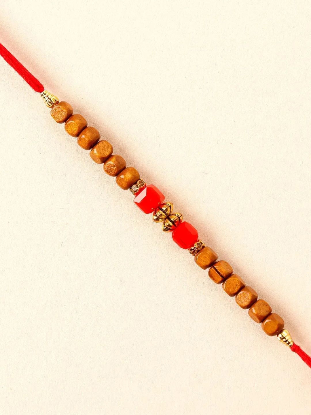 

fnp Crimson Charm Rakhi Silver Selections, Red