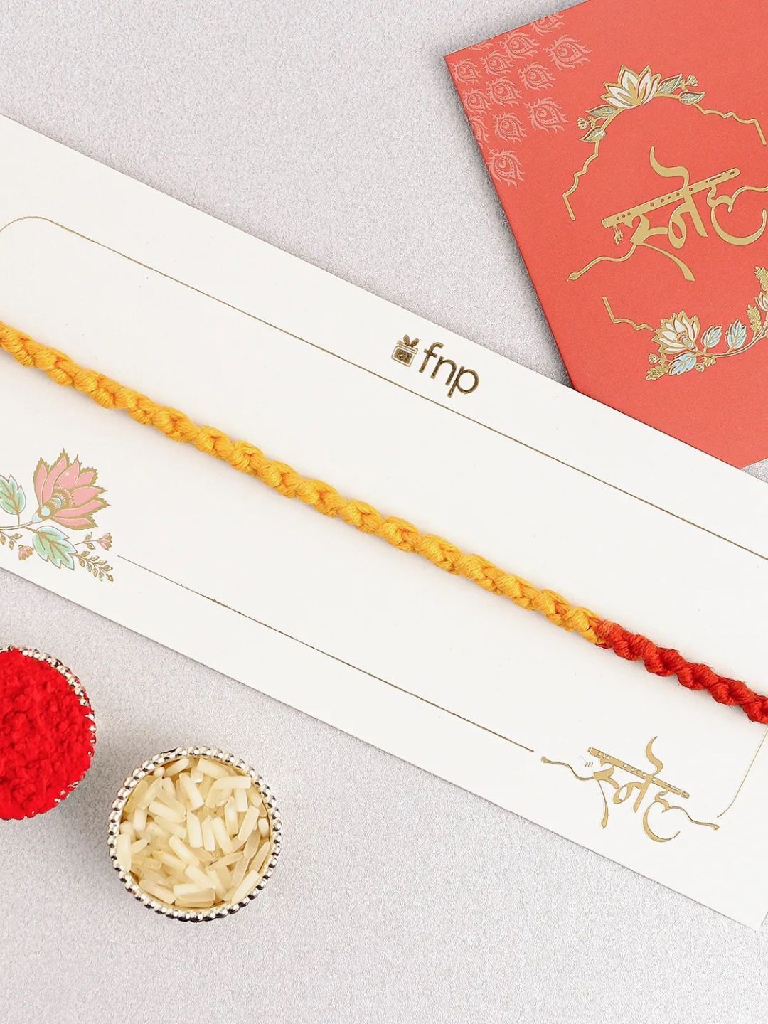 

fnp Traditional Mauli Thread Rakhi Classic Pearls, Red