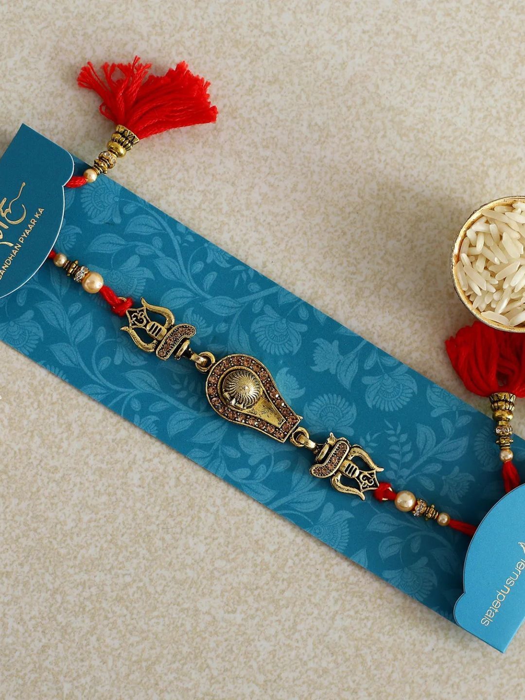 

fnp Traditional Shiva Rakhi Traditional Kundan, Brown