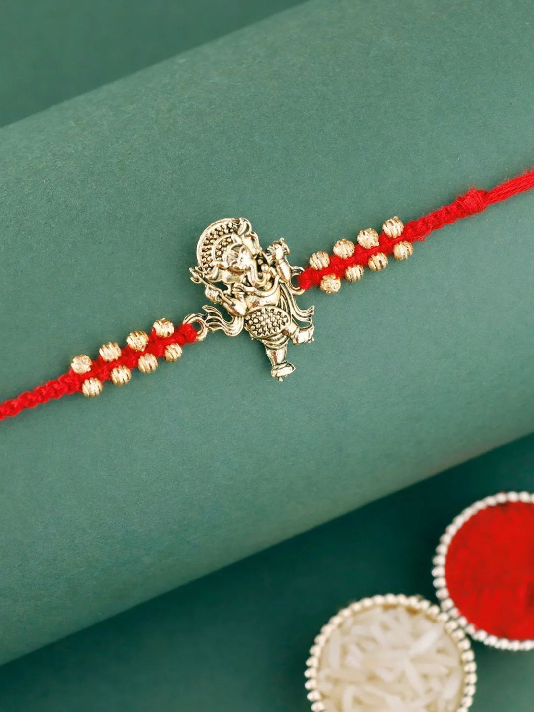 

fnp Ganesha Rakhi Divine Mauli Rakhis, Gold