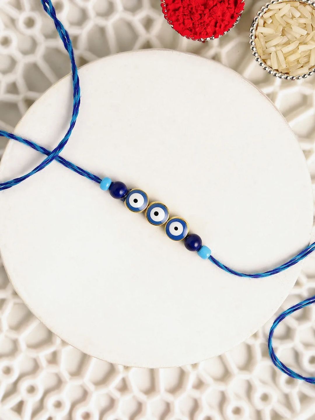 

fnp Minamalistic Navy Evil Eye Rakhi Classic Pearls, Blue