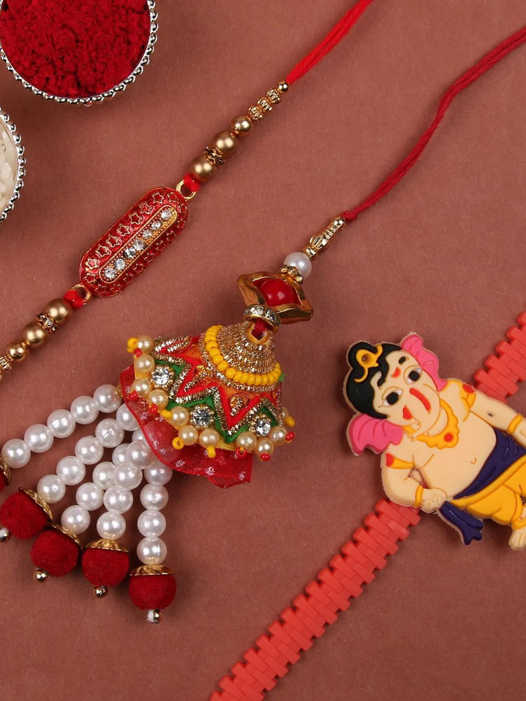 

fnp Bhaiya Bhabhi Rakhi Bal Ganesha Rakhi Traditional Kundan, Red