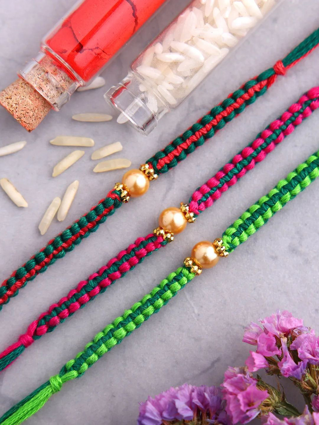 

fnp Set of 3 Vibrant Pearl Premium Rakhi Bhaiya-Bhabhi Rakhis, Gold