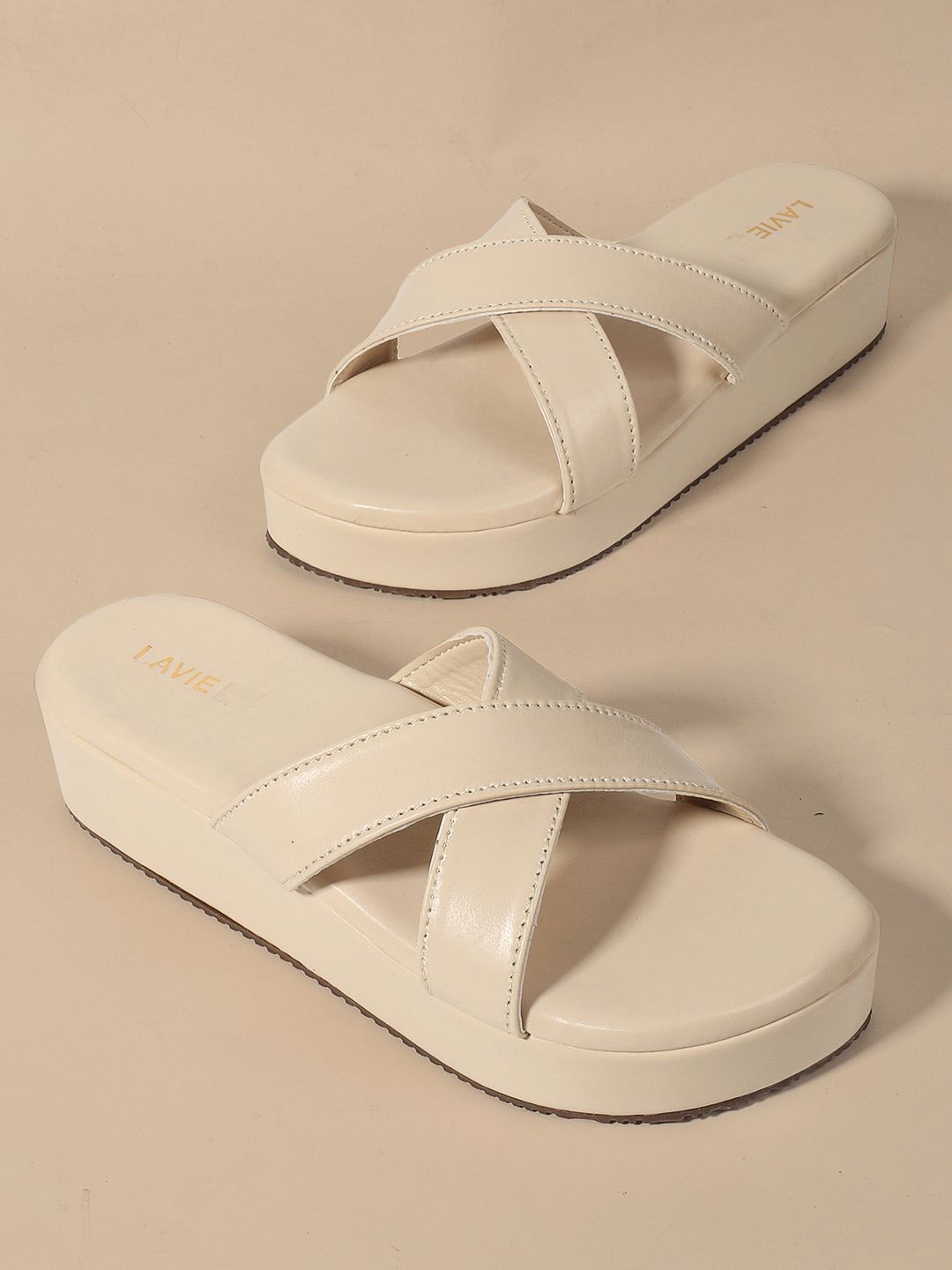 

Lavie Women Cross Strap Open Toe Wedge Heels, Cream