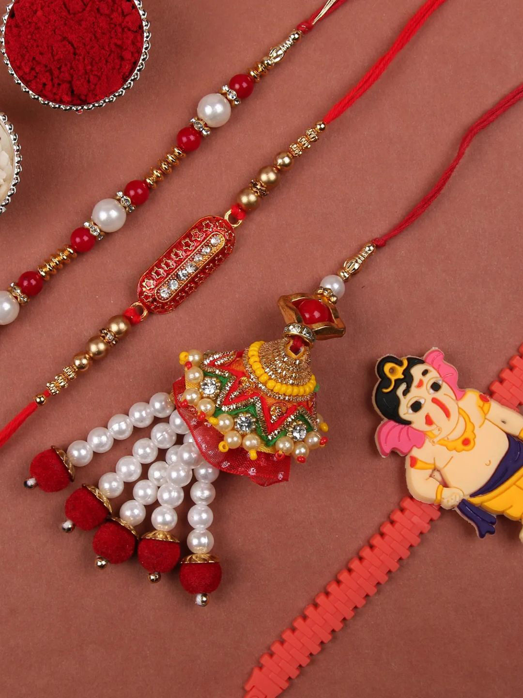 

fnp Designer Family Rakhi Set Traditional Kundan, Red