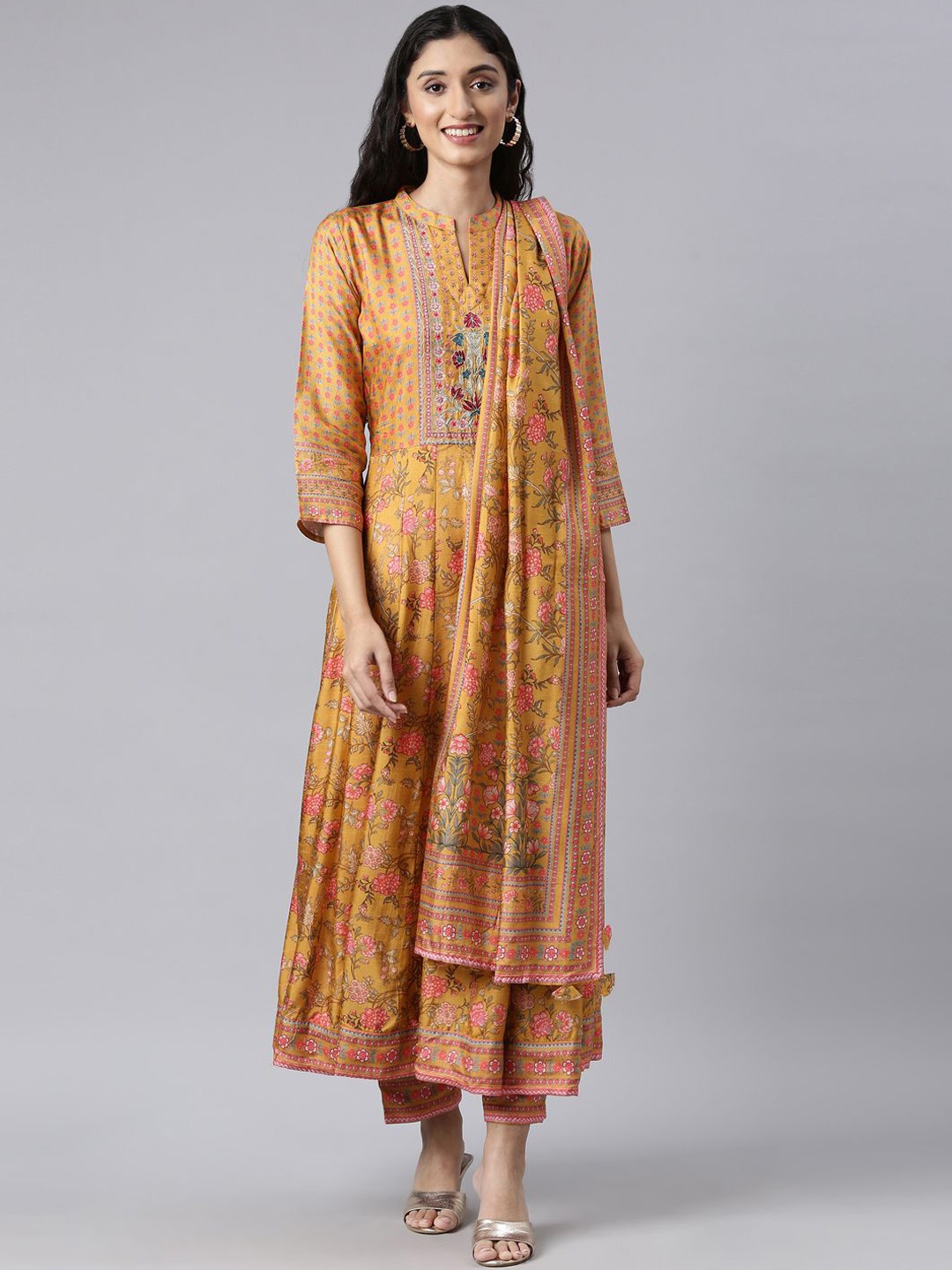 

Neerus Women Floral Printed Regular Raw Silk Kurta with Trousers & With Dupatta, Mustard